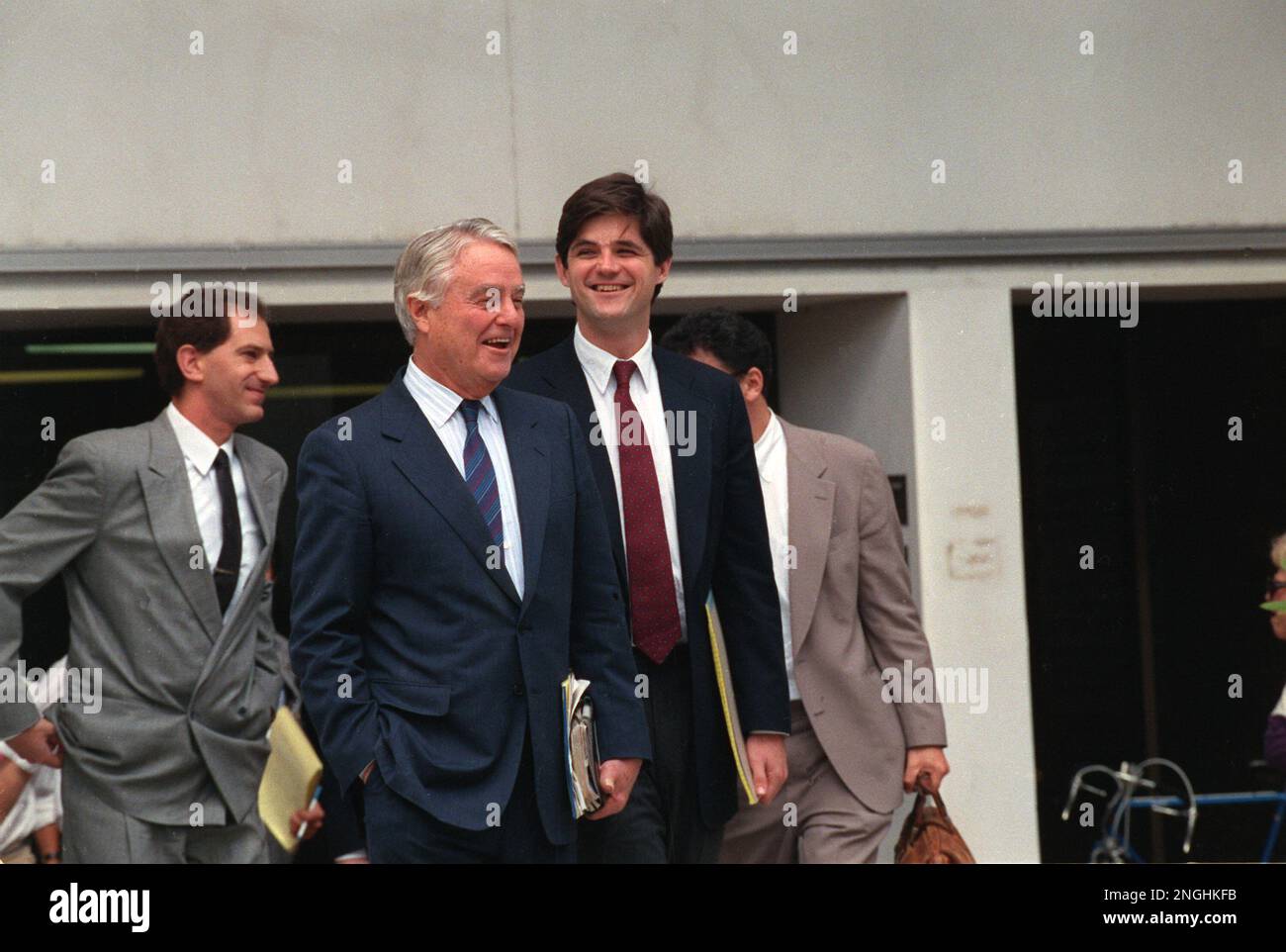 Sargent Shriver, former Peace Corps Director, left, laughs with his ...