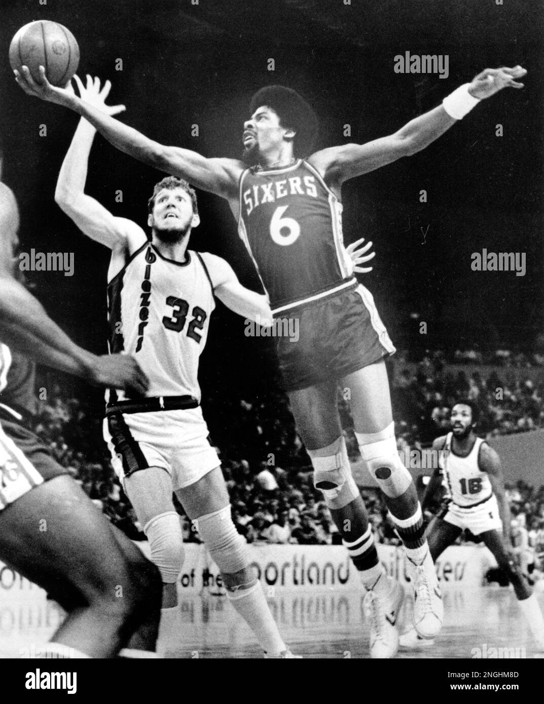 Julius Erving of the Philadelphia 76ers call out a play during a