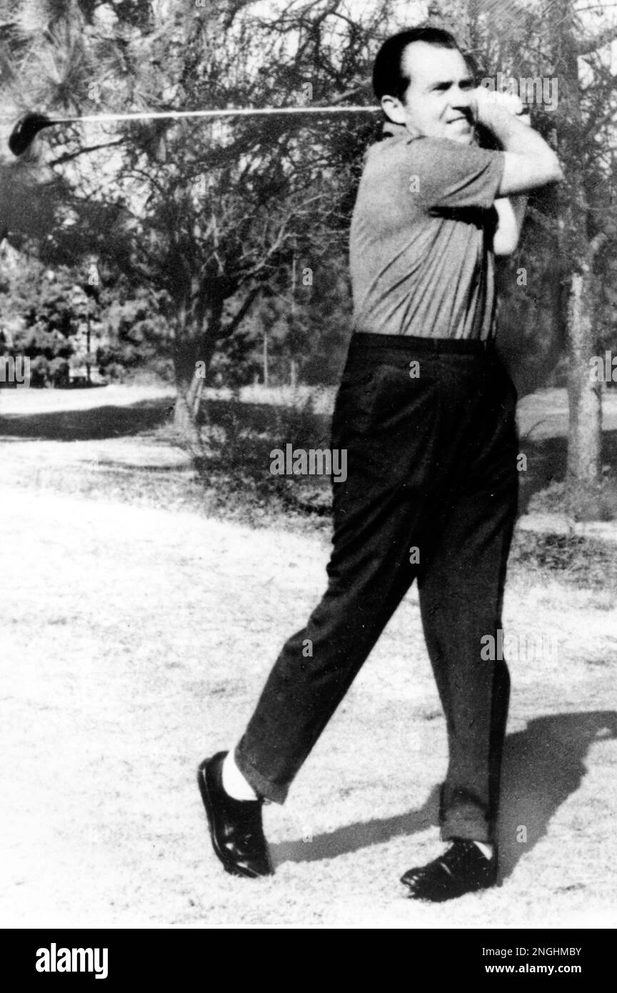 Former U.S. Vice President Richard M. Nixon is shown driving from the