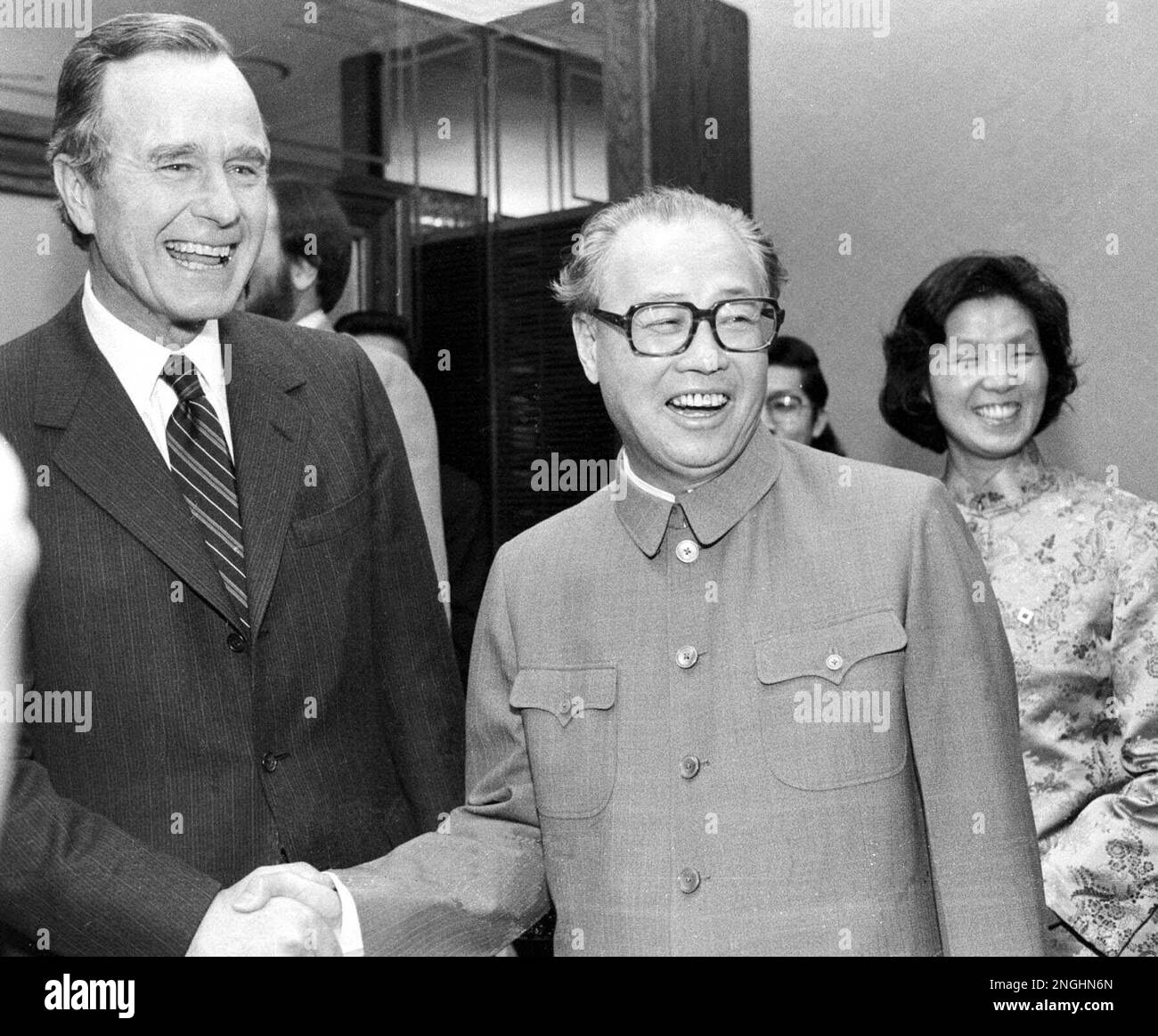 China's Premier Zhao Ziyang, right, shakes hands with Vice President ...