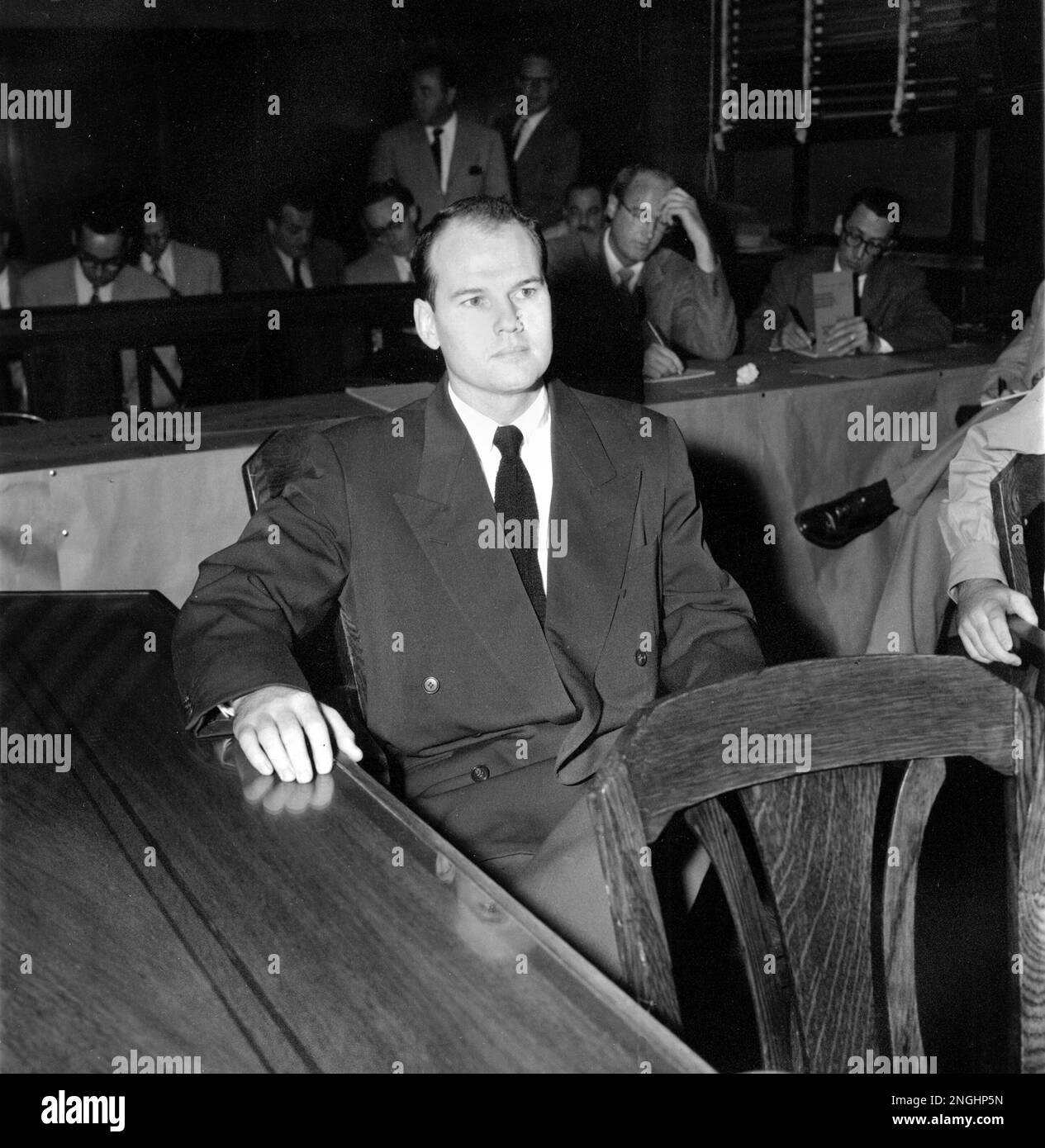 Dr. Samuel H. Sheppard sits in a courtroom before the start of his ...