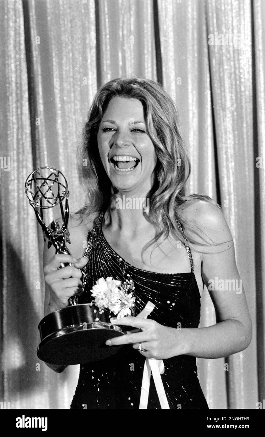 Actress Lindsay Wagner laughs as she holds her Emmy award at the 29th ...
