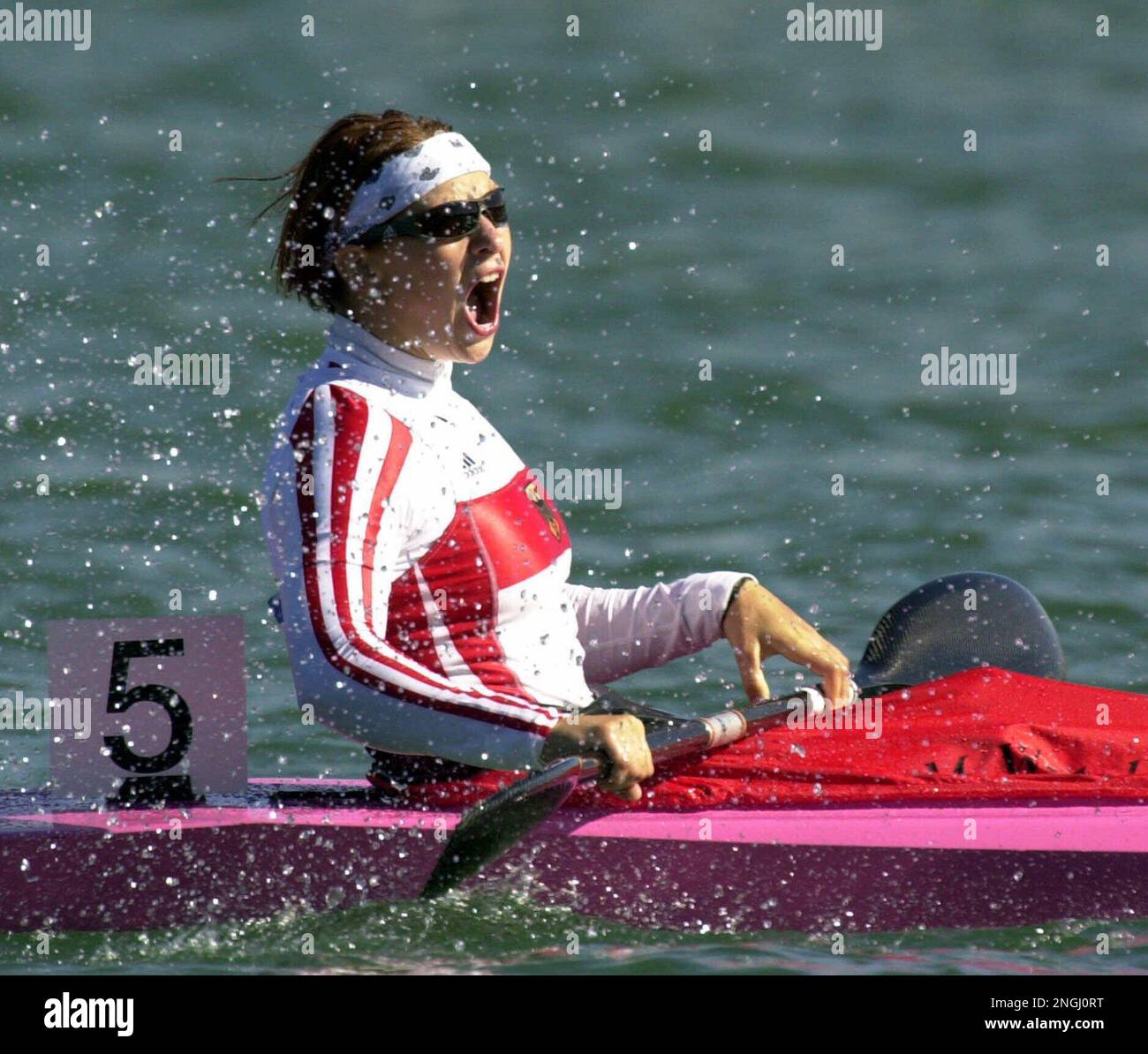 water-splashes-in-the-face-of-germany-s-katrin-wagner-as-she-shouts