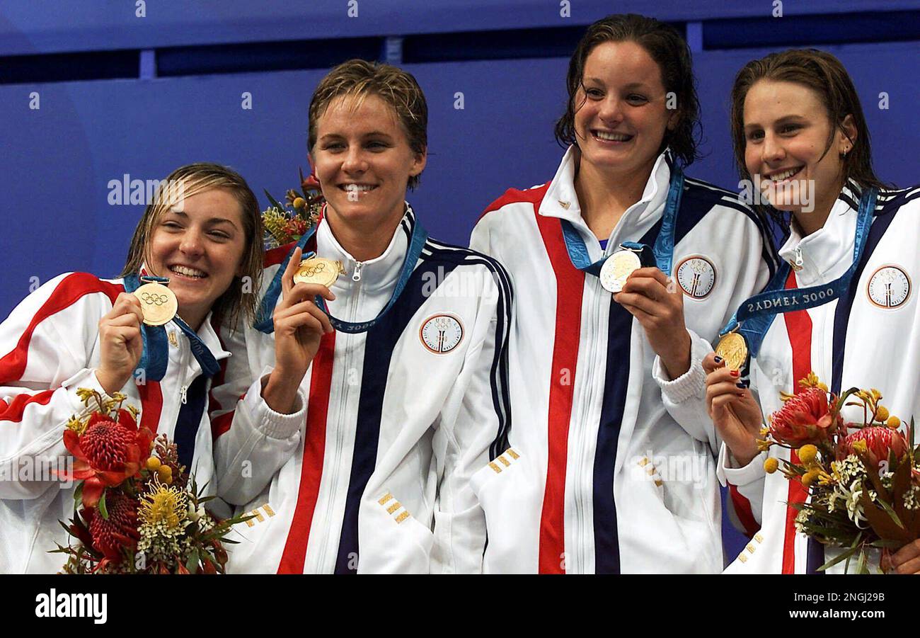 U.S. swimmers (from left) Diana Munz, Jenny Thompson, Lindsay Benko