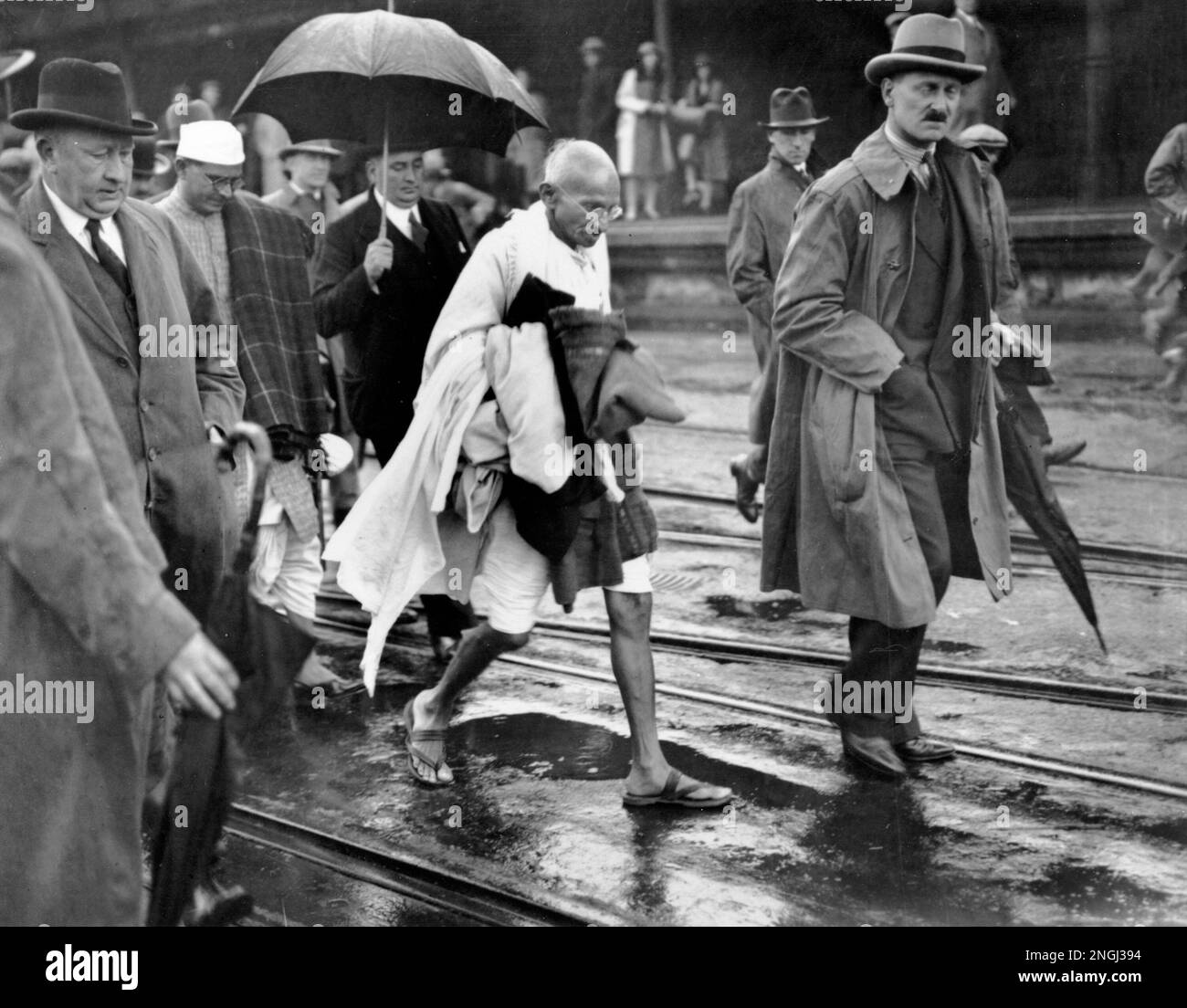 India s Leader Mahatma Gandhi Accompanied By His Entourage Arrives At india-s-leader-mahatma-gandhi-accompanied-by-his-entourage-arrives-at