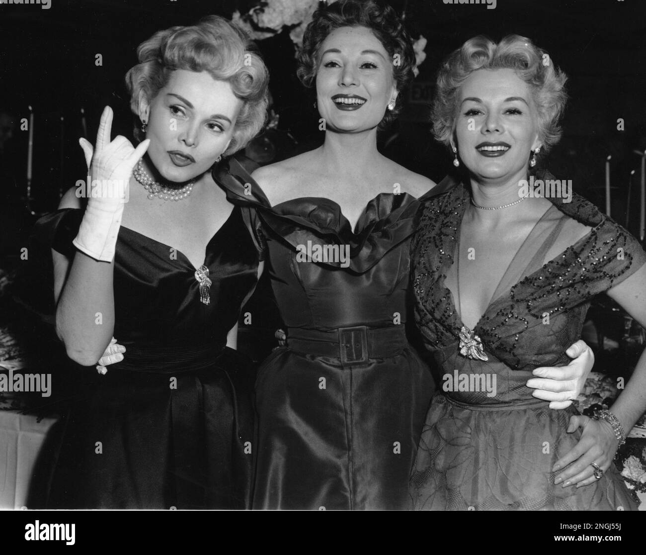 The Gabor sisters pose at a cocktail party at Ciros to celebrate their