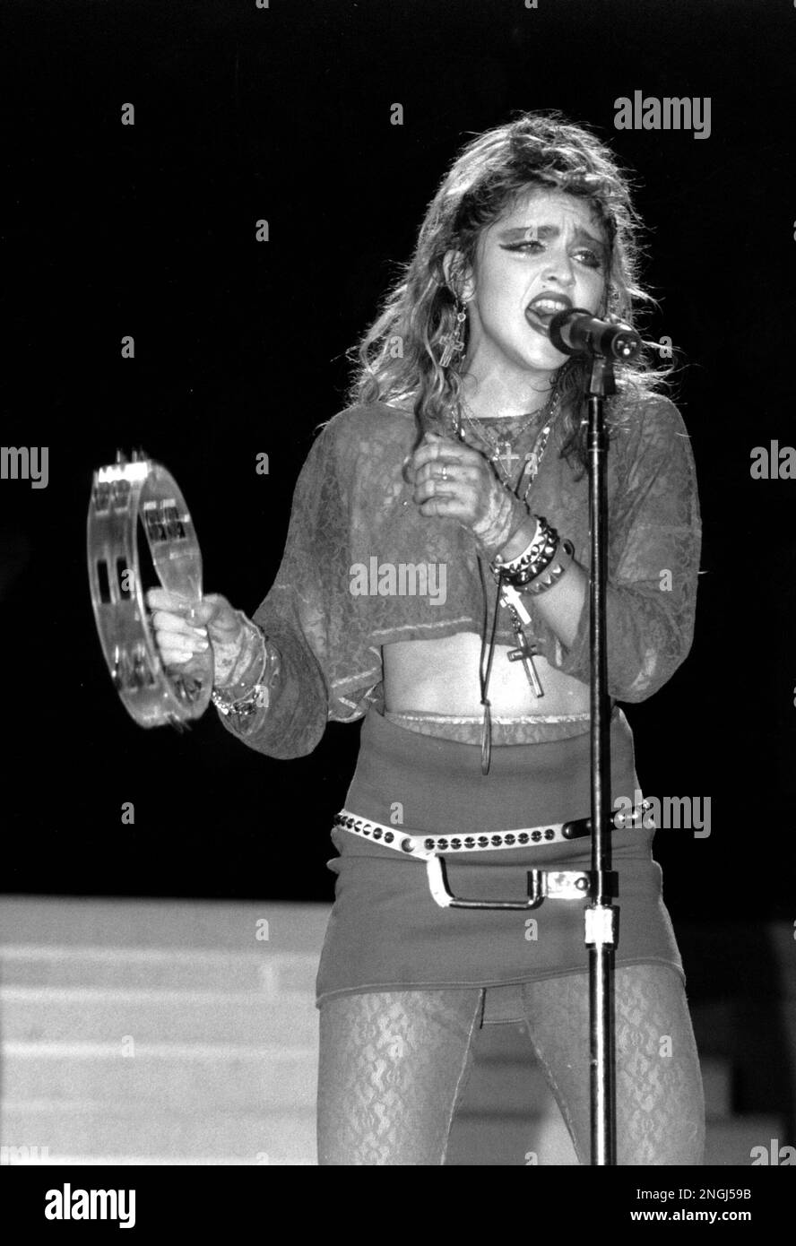 Madonna sings during a Live Aid concert in Philadelphia's JFK 