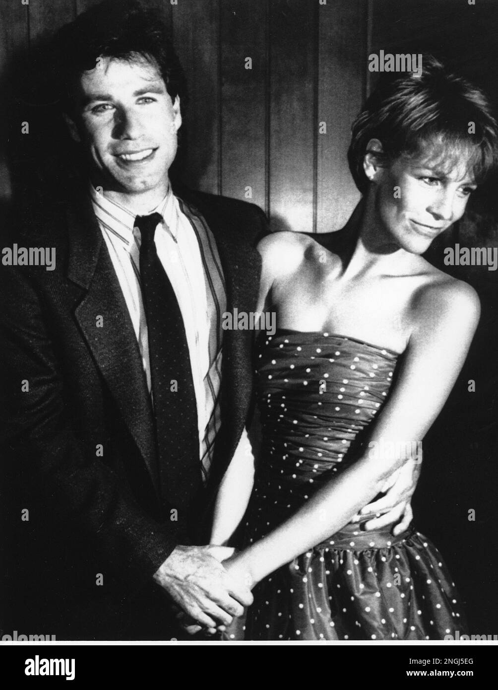 John Travolta and Jamie Lee Curtis pose at the premiere of their movie