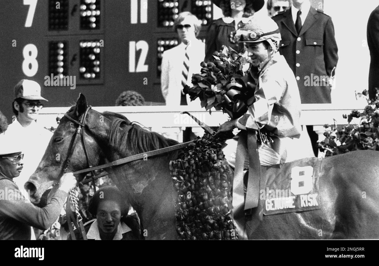 This photo shows Genuine Risk and jockey Jacinto Vasquez with roses in ...