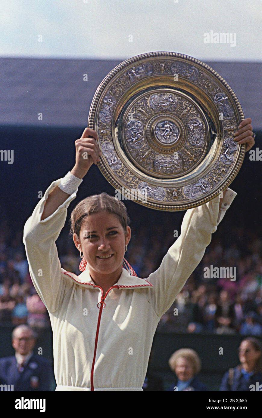 Chris Evert holds up her trophy after winning Wimbledon in this July ...