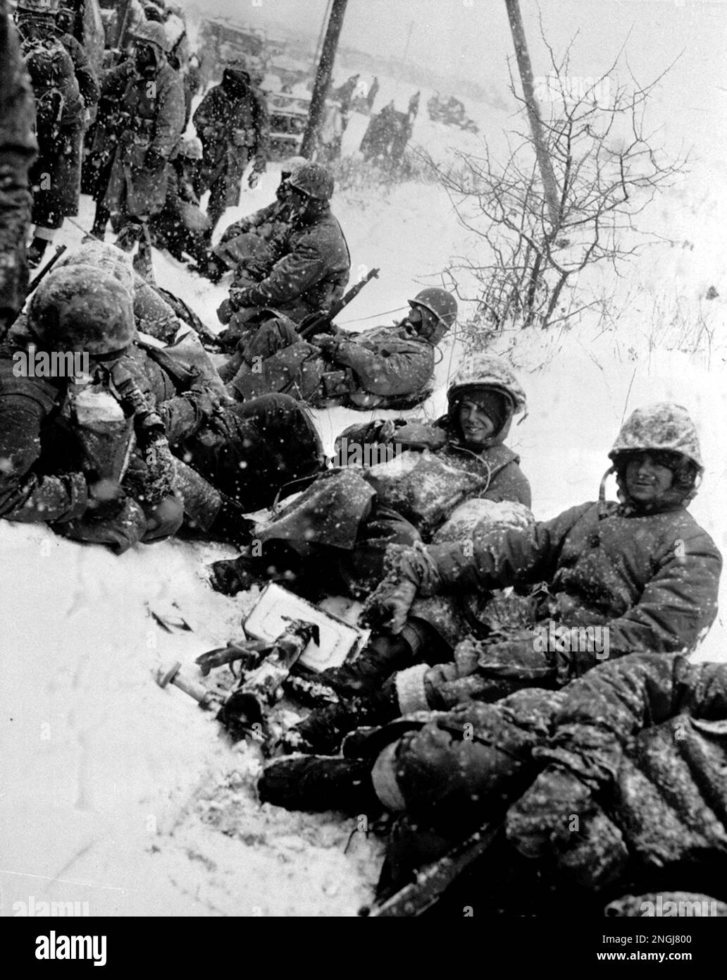In this photo released by the U.S. Marines, a group of Marines fighting ...