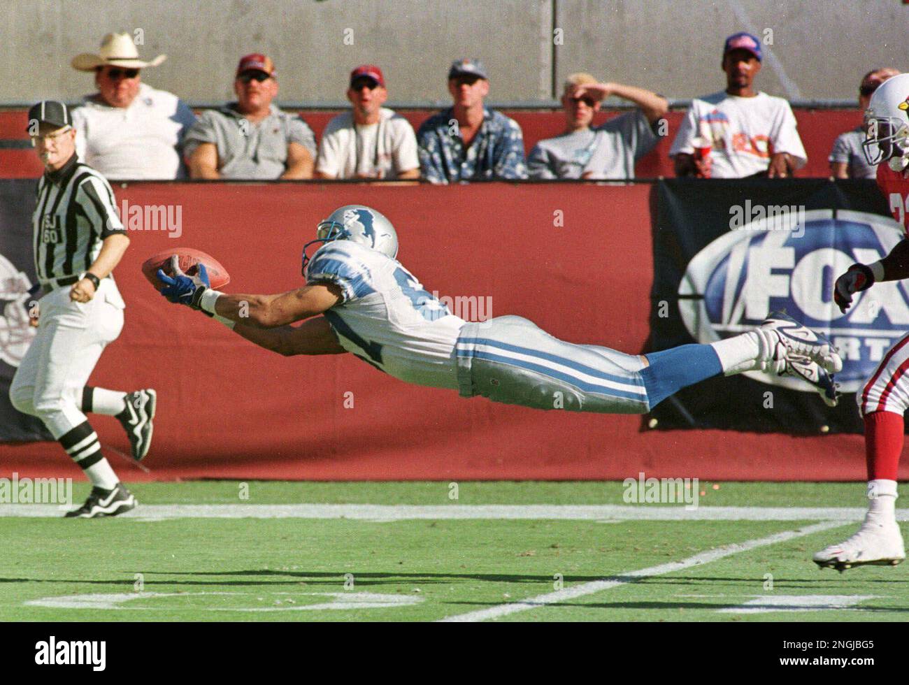 Kansas City Chiefs wide receiver Johnnie Morton leapt to slap hands with  fans after the Chiefs defeated the Detroit Lions on Sunday, December 14,  2003 at Arrowhead Stadium in Kansas City, Missouri.