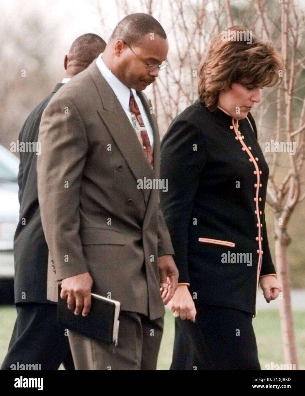 Former Chicago Bears player Mike Singletary and his wife, Kim, arrive for  private services for Bears great Walter Payton on Friday, Nov. 5, 1999, at  Life Changers Church in South Barrington, Ill.