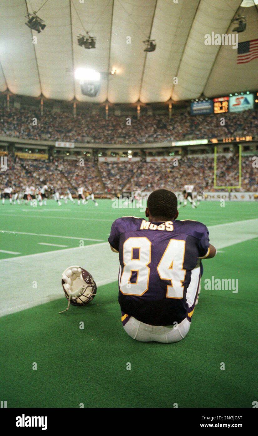 Minnesota Vikings wide receiver Randy Moss sits alone as he Minnesota Vikings wide receiver Randy Moss sits alone as he