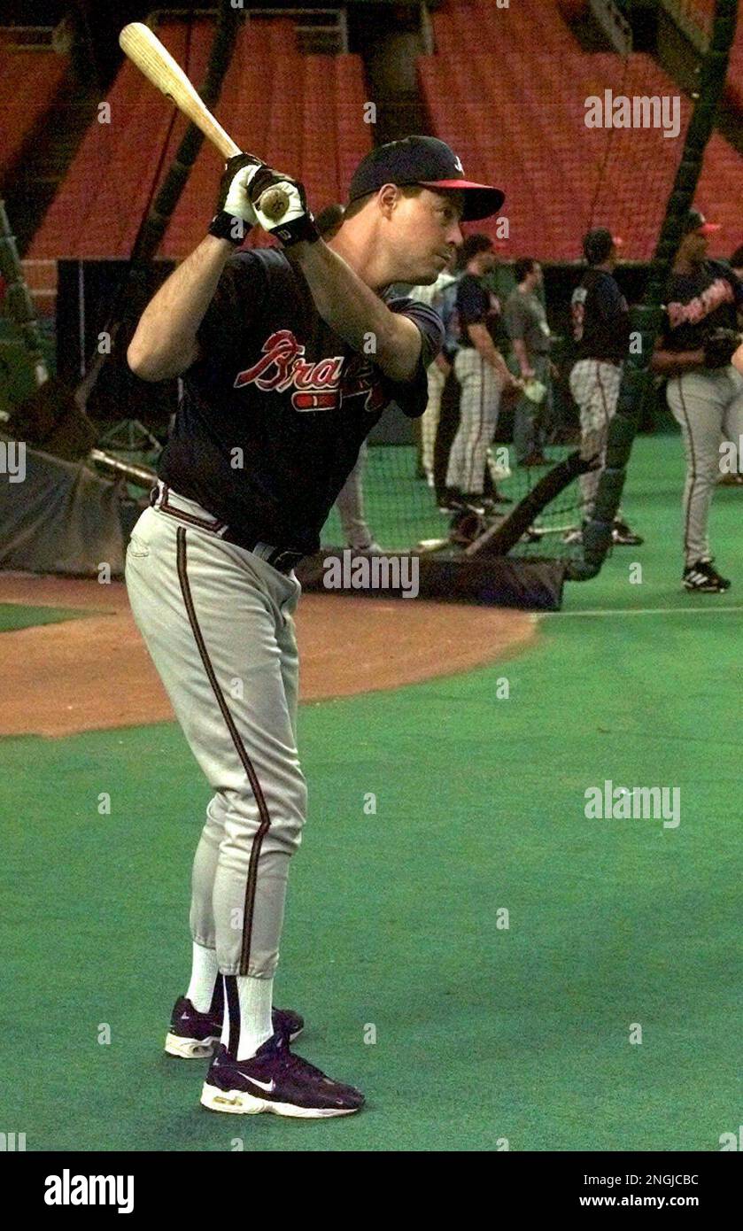 Atlanta Braves pitcher Greg Maddux practices his golf swing during practice  Thursday, Oct. 7, 1999 in Houston. The Braves face the Houston Astros  Friday for Game 3 of their National League division