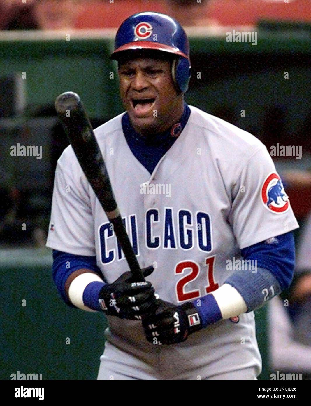 Chicago Cubs' Sammy Sosa steps out of the batters box during the fourth  inning against the Houston Astros Sunday, Sept. 12, 1999 in Houston. Sosa  did not hit any home runs during