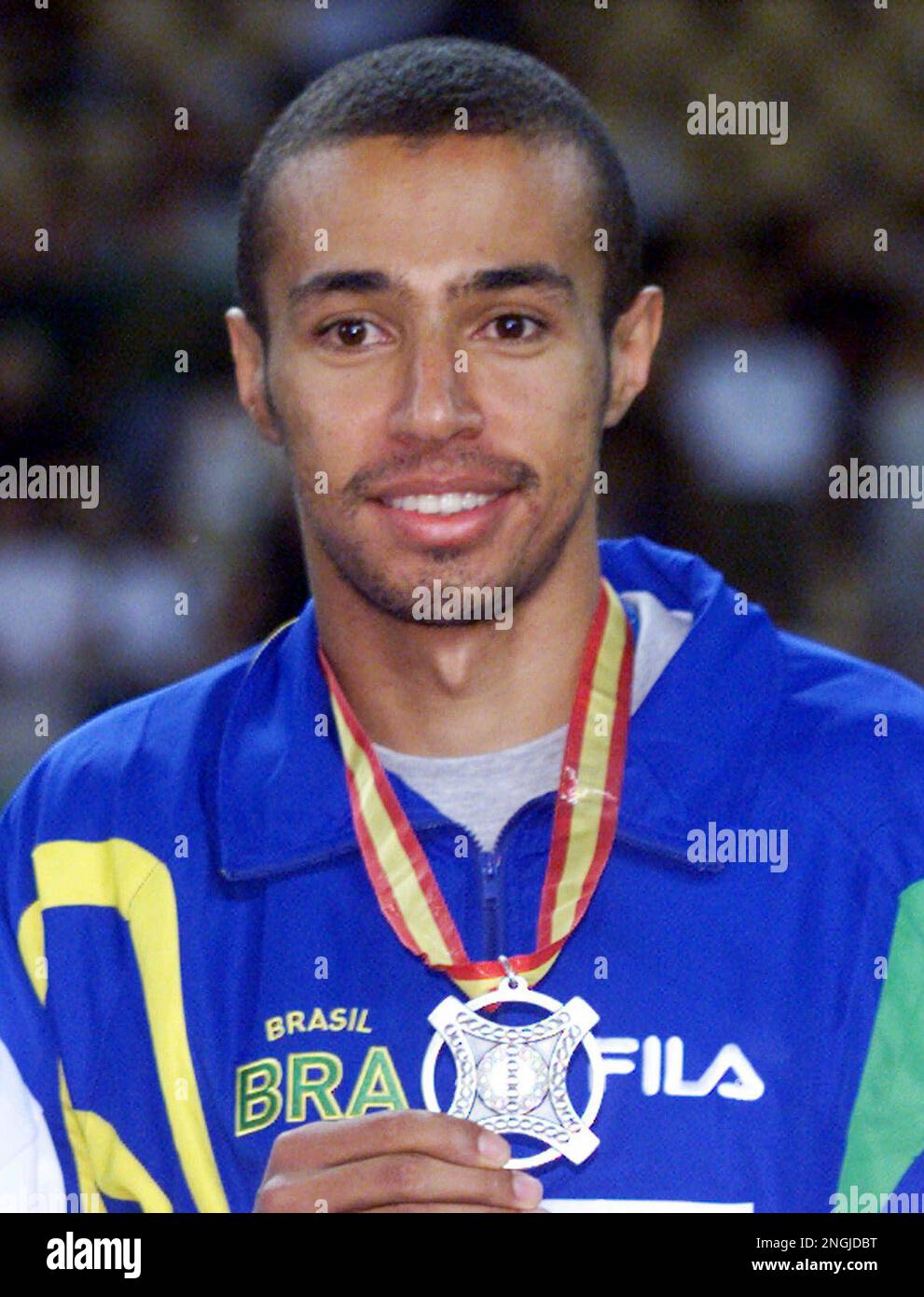 Brazil's Sanderlei Claro Parrela shows off his silver medal on the
