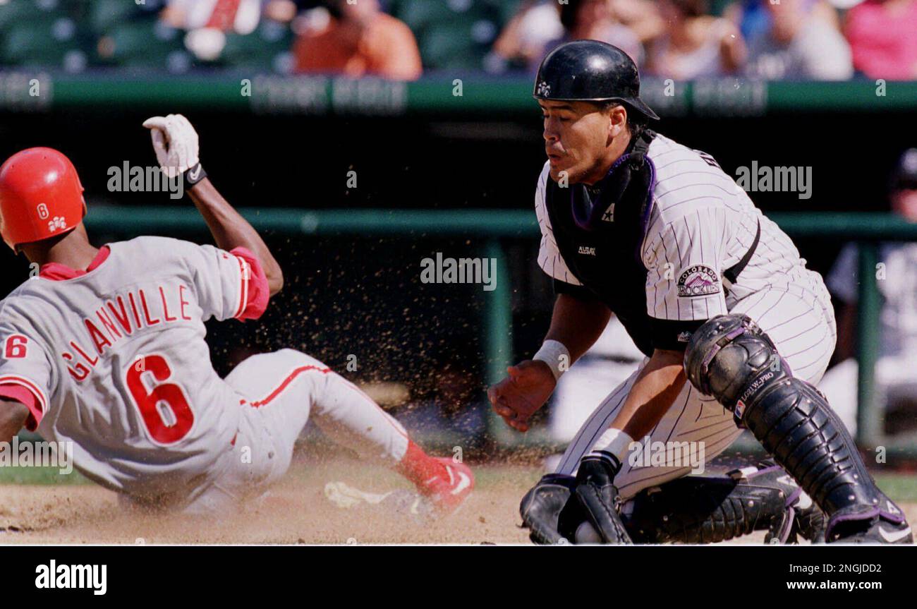 Philadelphia Phillies' Bobby Abreu slides home for an inside-the-park homer  against the New York Mets in the second inning Friday, May 14, 1999 in  Philadelphia. (AP Photo/ George Widman Stock Photo 