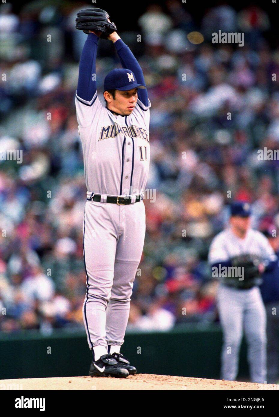 Milwaukee Brewers starting pitcher Hideo Nomo goes into his windup to  deliver a pitch to Colorado Rockies leadoff hitter Darryl Hamilton in the  first inning in Denver's Coors Field Saturday, June 5