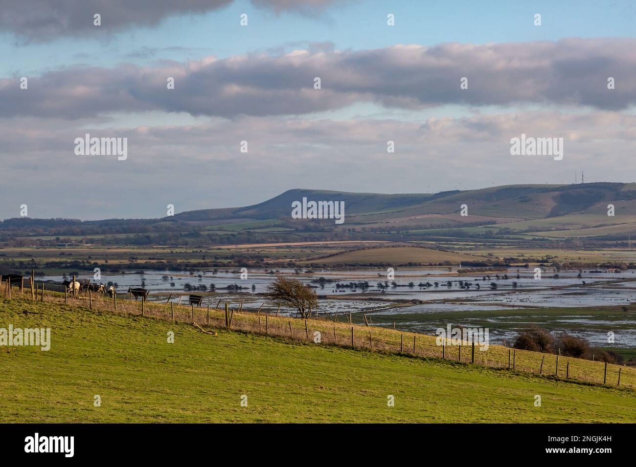 Flooded farmland in the South Downs as seen from a hillside near Lewes, on a January day Stock Photo