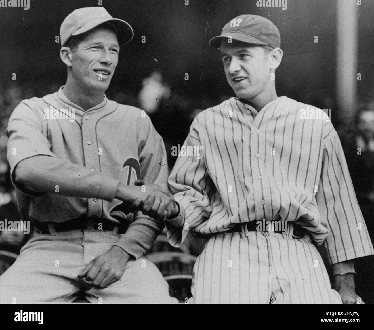 New York Yankees pitcher Vernon Gomez and Athletics pitcher Robert "Lefty" Grove, shake hands at