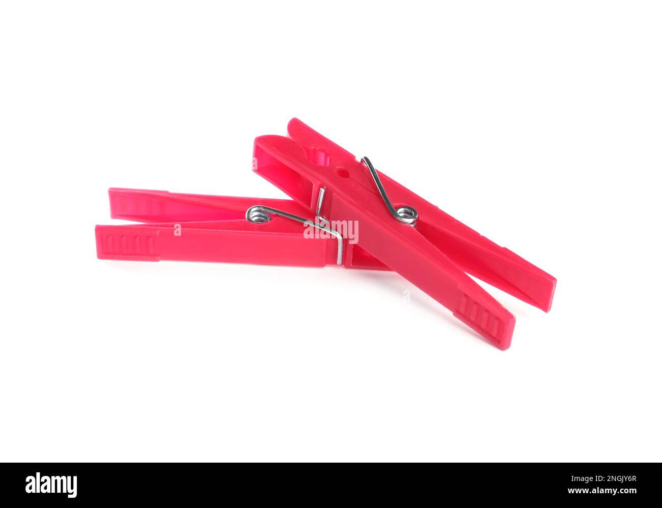 Bright pink plastic clothespins on white background Stock Photo Alamy