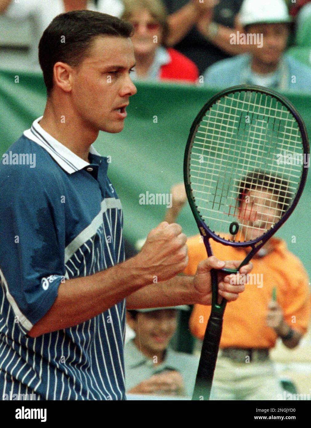 Italian player Renzo Furlan jubilates after winning his first round match  against Germany's player Boris Becker in the Monte Carlo tennis Open, in  Monaco, Tuesday, April 22,1997. Furlan won 1-6. 6-3, 7-6. (