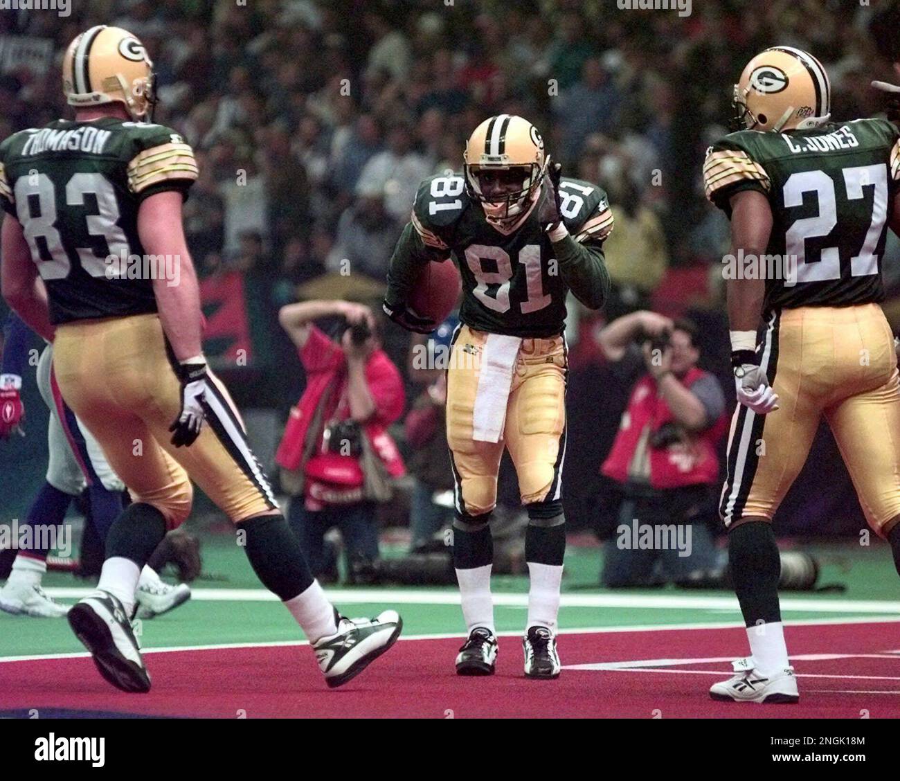 Green Bay Packers' Desmond Howard (81) dances after making a