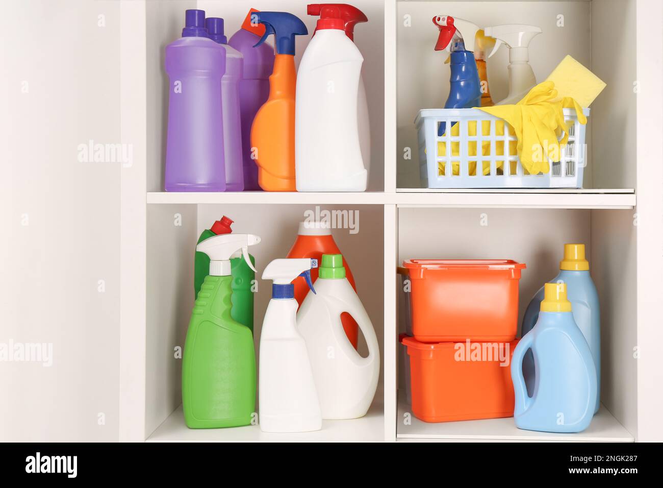 https://c8.alamy.com/comp/2NGK287/different-cleaning-supplies-and-tools-on-shelves-2NGK287.jpg