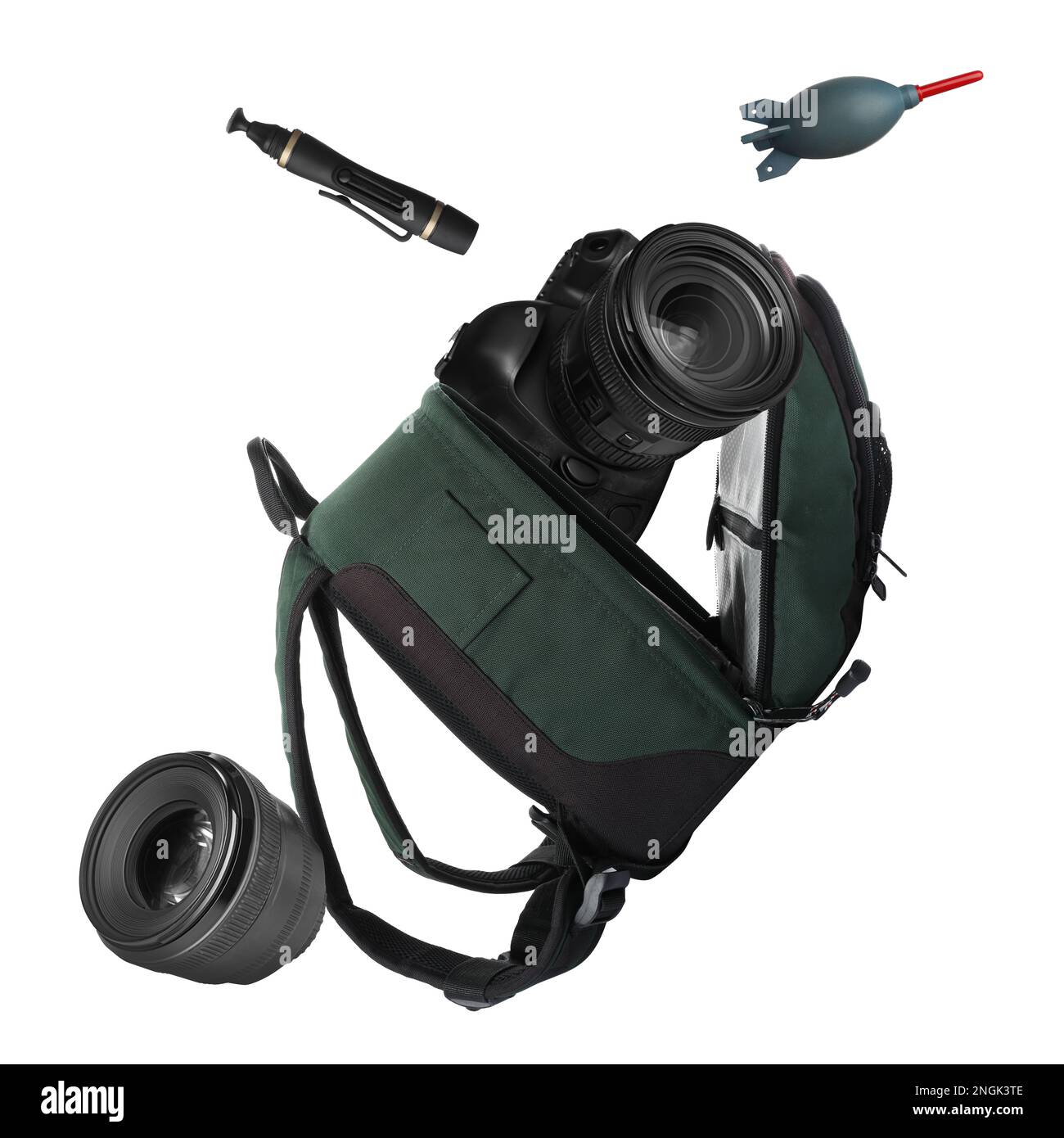 Different professional photography equipment falling on beige