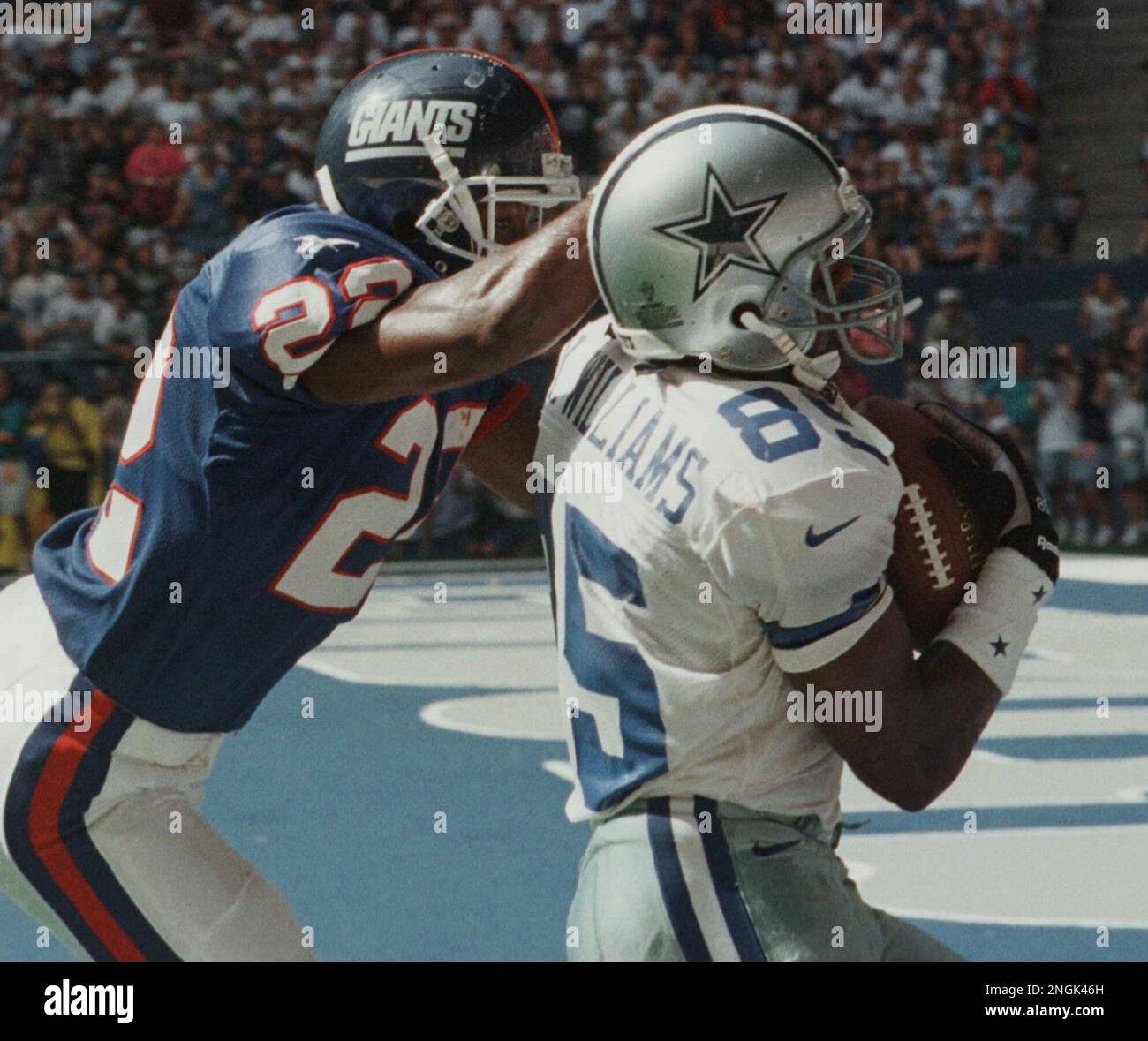 Dallas Cowboys receiver Kevin Williams catches a touchdown pass ahead