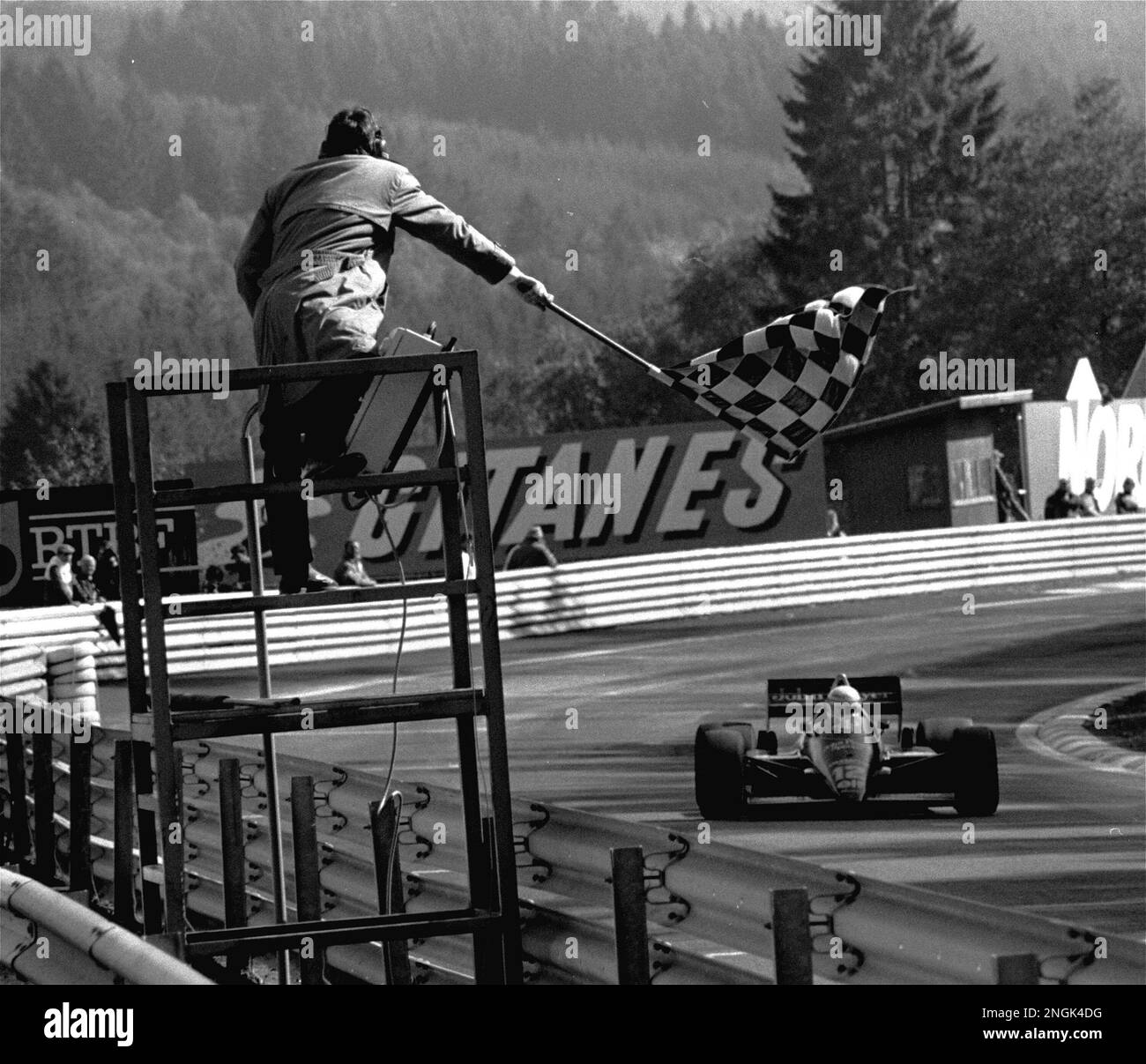 Ayrton Senna of Brazil at the wheel of his JPS Renault crosses the ...