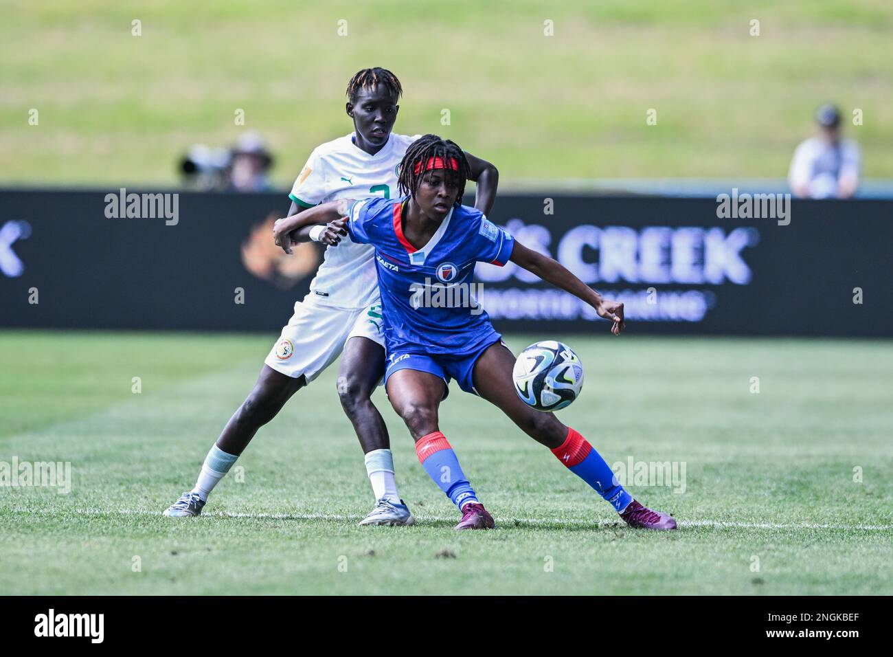 Auckland, New Zealand. 18th Feb, 2023. Mareme Babou (L) of Senegal Women's National team and Vatcheba Louisin of Haiti National Women's team in action during the FIFA Women's World Cup 2023 Playoff between Haiti and Senegal at the Norther Harbour Stadium. Final score; Senegal 0:4 Haiti. (Photo by Luis Veniegra/SOPA Images/Sipa USA) Credit: Sipa USA/Alamy Live News Stock Photo