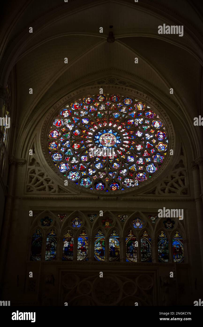 Rose window worked with colored glass inside the Cathedral of Toledo