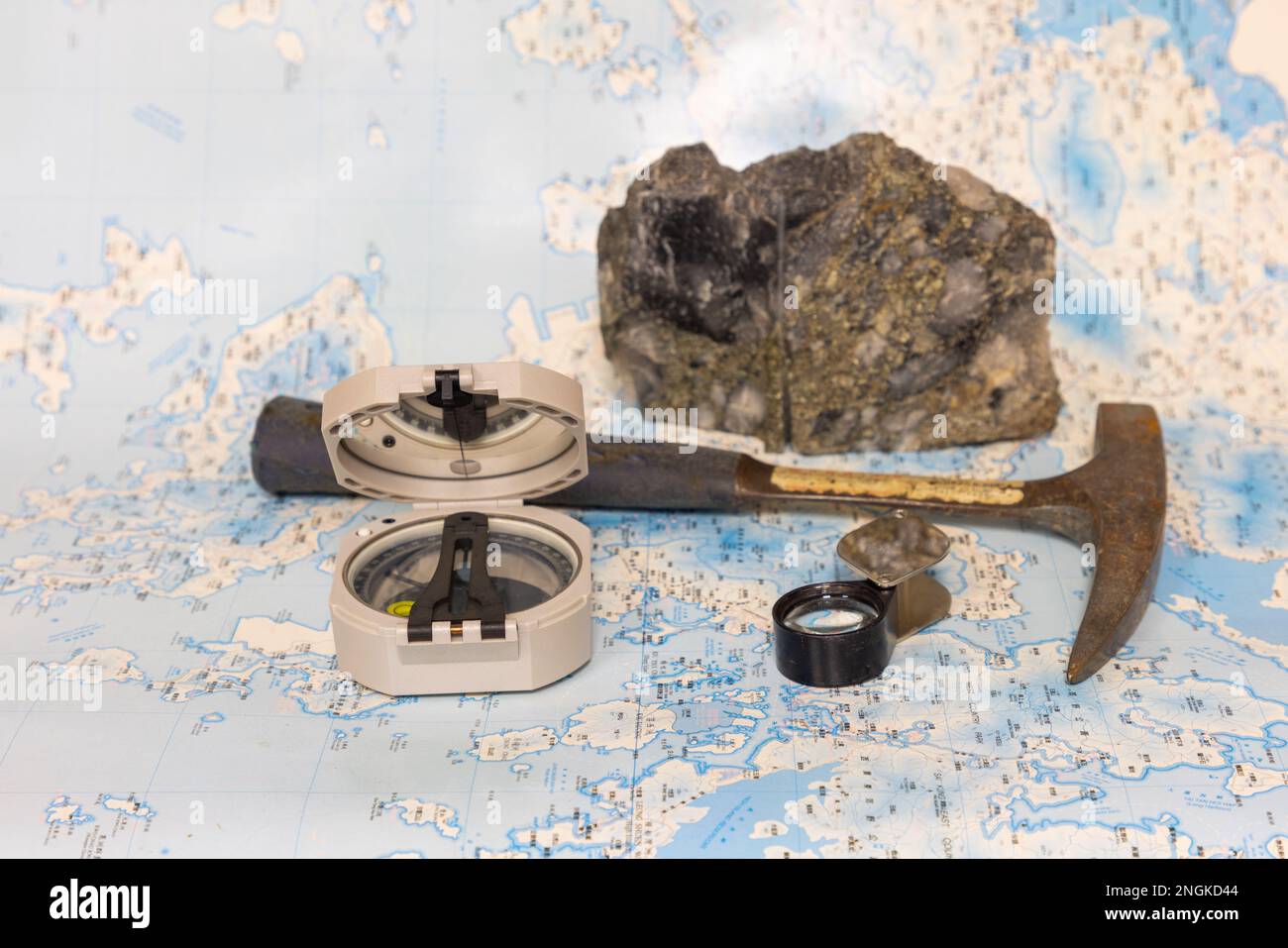 Geological fieldwork tools hammer - Geological Fieldwork Tools Hammer Compass Magnifying Glass Rock Samples Topographic And Geological Maps 2NGKD44 