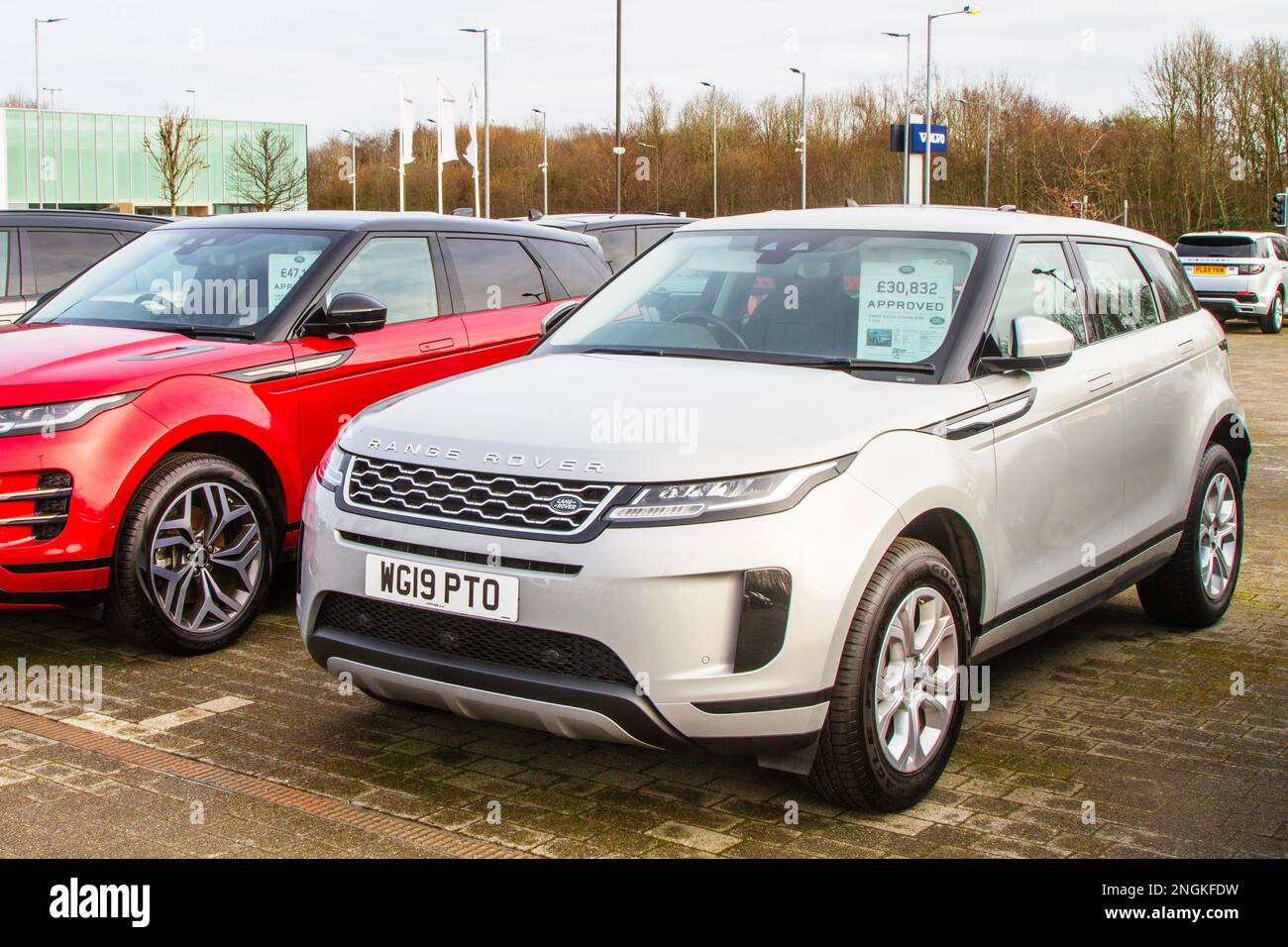 Silver land rover range rover evoque cars hires stock photography and