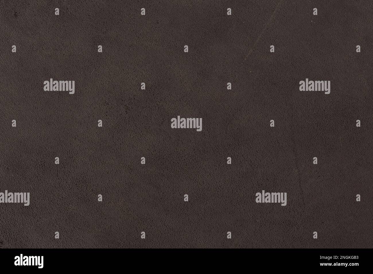 Dark brown leather texture, abstract background. Can be used as background in art projects. Stock Photo