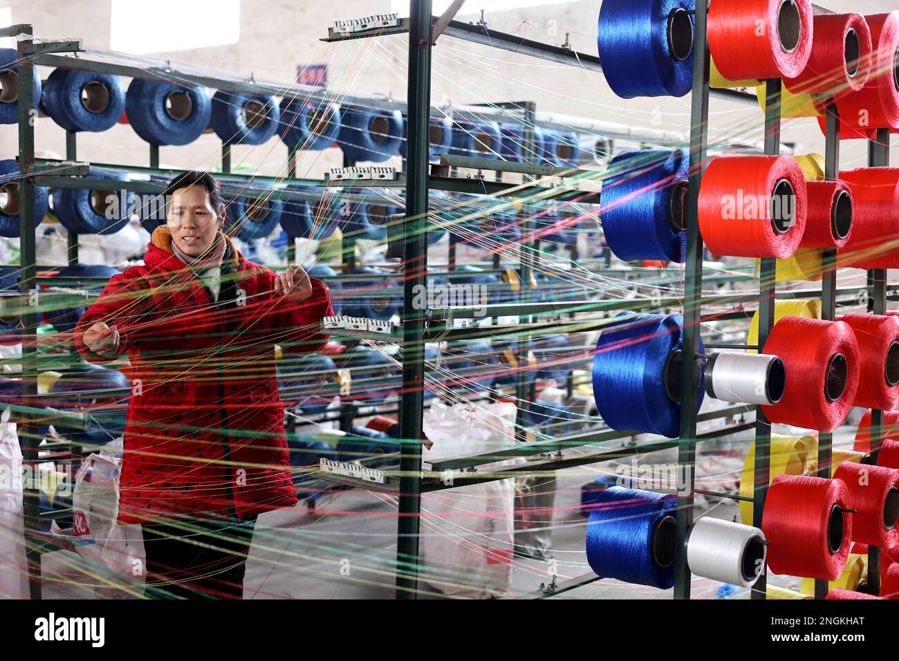 BINZHOU, CHINA FEBRUARY 18, 2023 A worker produces rope net