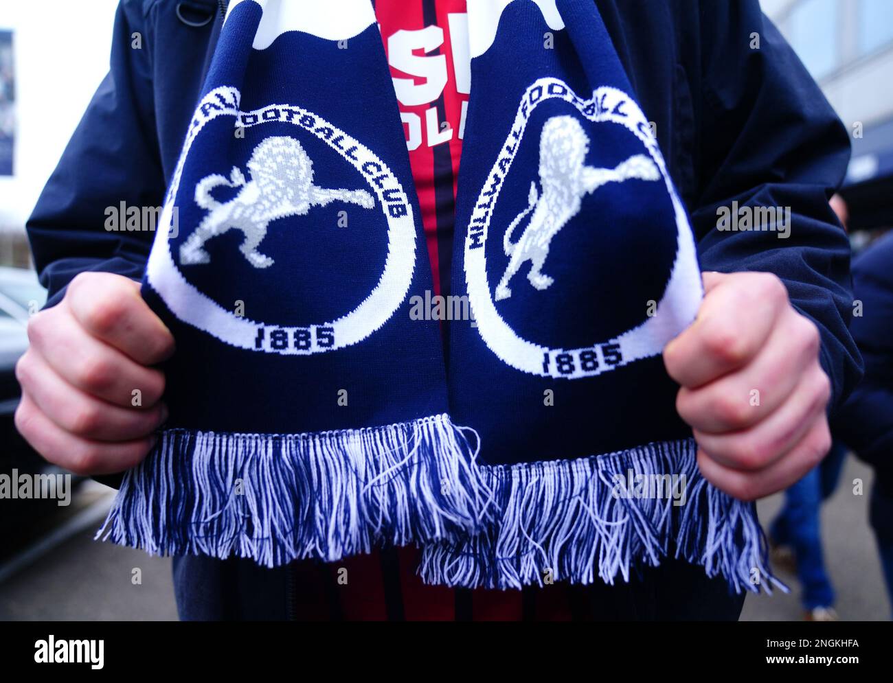 A fan in a Millwall scarf ahead of the Sky Bet Championship match at The  Den, London. Picture date: Saturday February 18, 2023 Stock Photo - Alamy