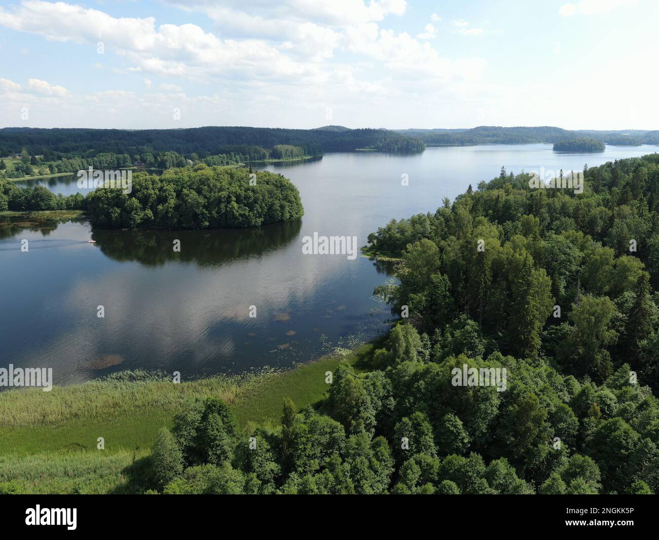 Aerial photo of a wild lake and green forests Stock Photo - Alamy
