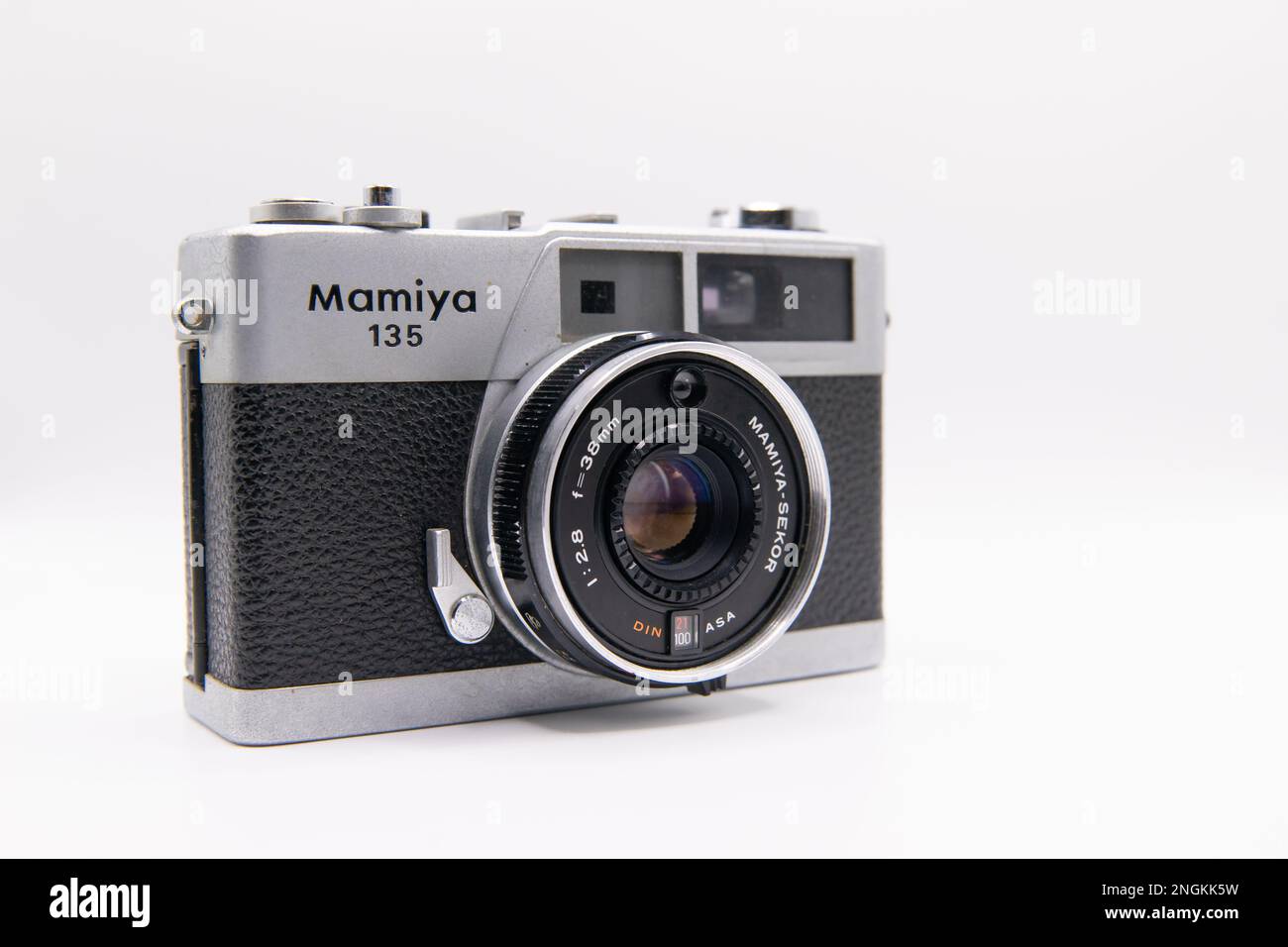Closeup shot of Mamiya 135 EE rangefinder camera with Mamiya Sekkor 38mm lens on white background Stock Photo