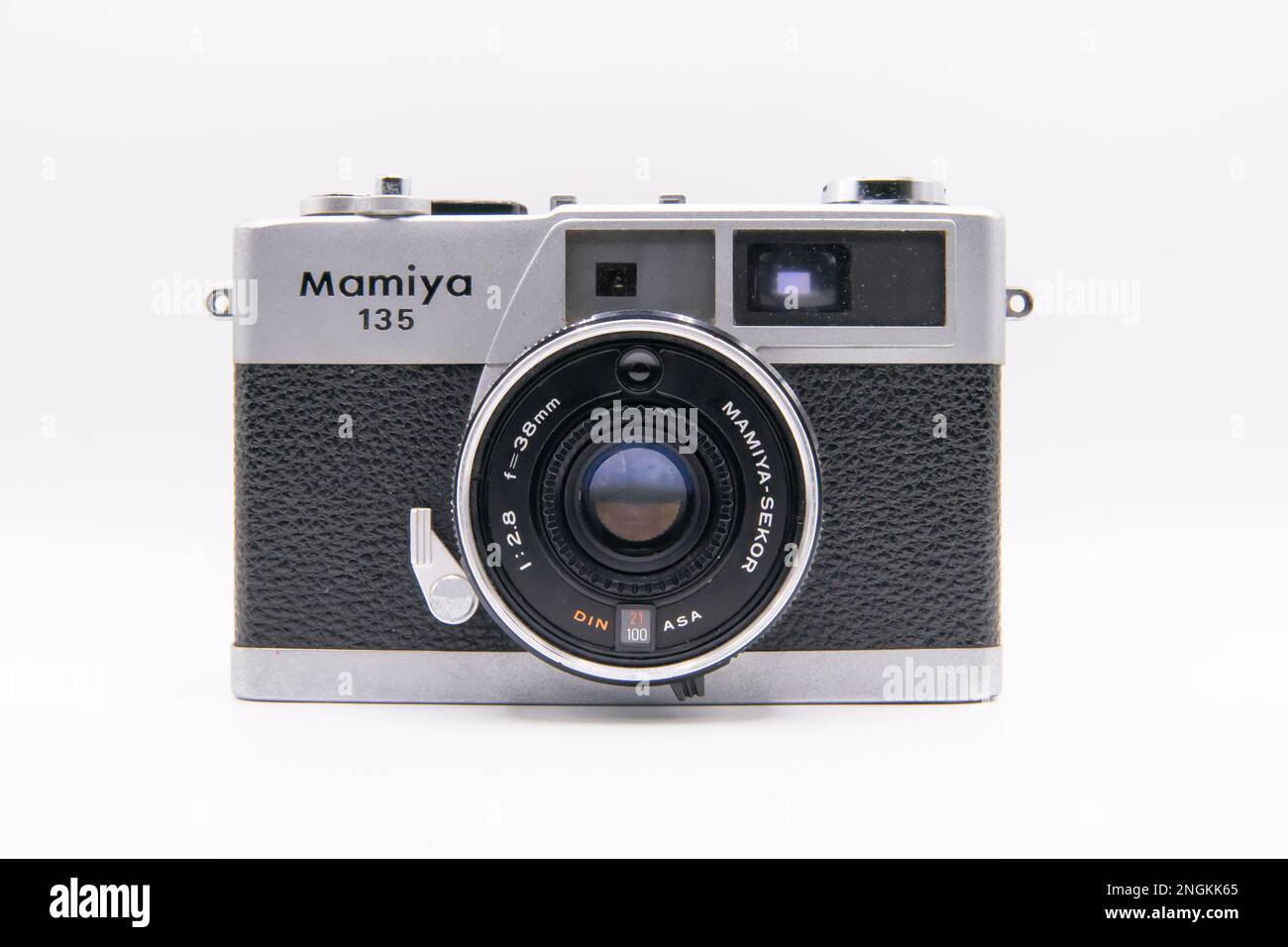 Closeup face on shot of Mamiya 135 EE rangefinder camera with Mamiya Sekkor 38mm lens on white background Stock Photo
