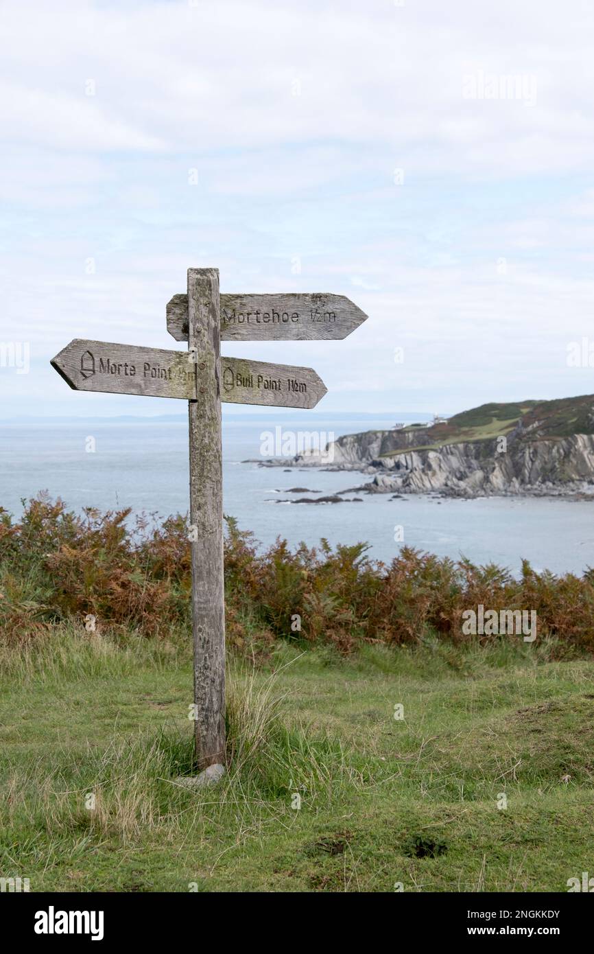 Footpath sign giving directions to Morte Point, Bull Point an Morethoe along the North Devon coast, Devon, UK. Stock Photo