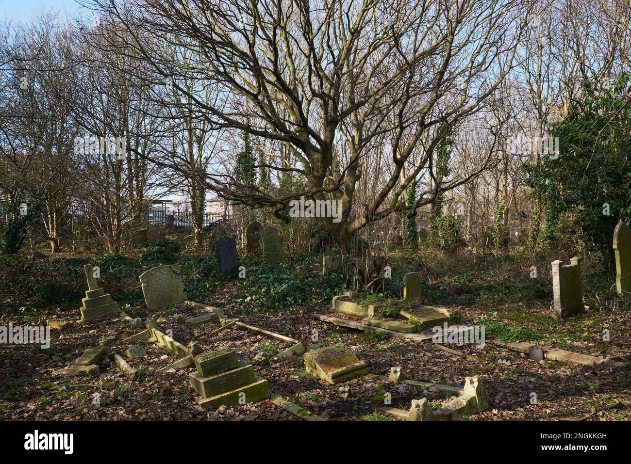 The old churchyard at St Mary Magdalene church, East Ham, in London's East End Stock Photo