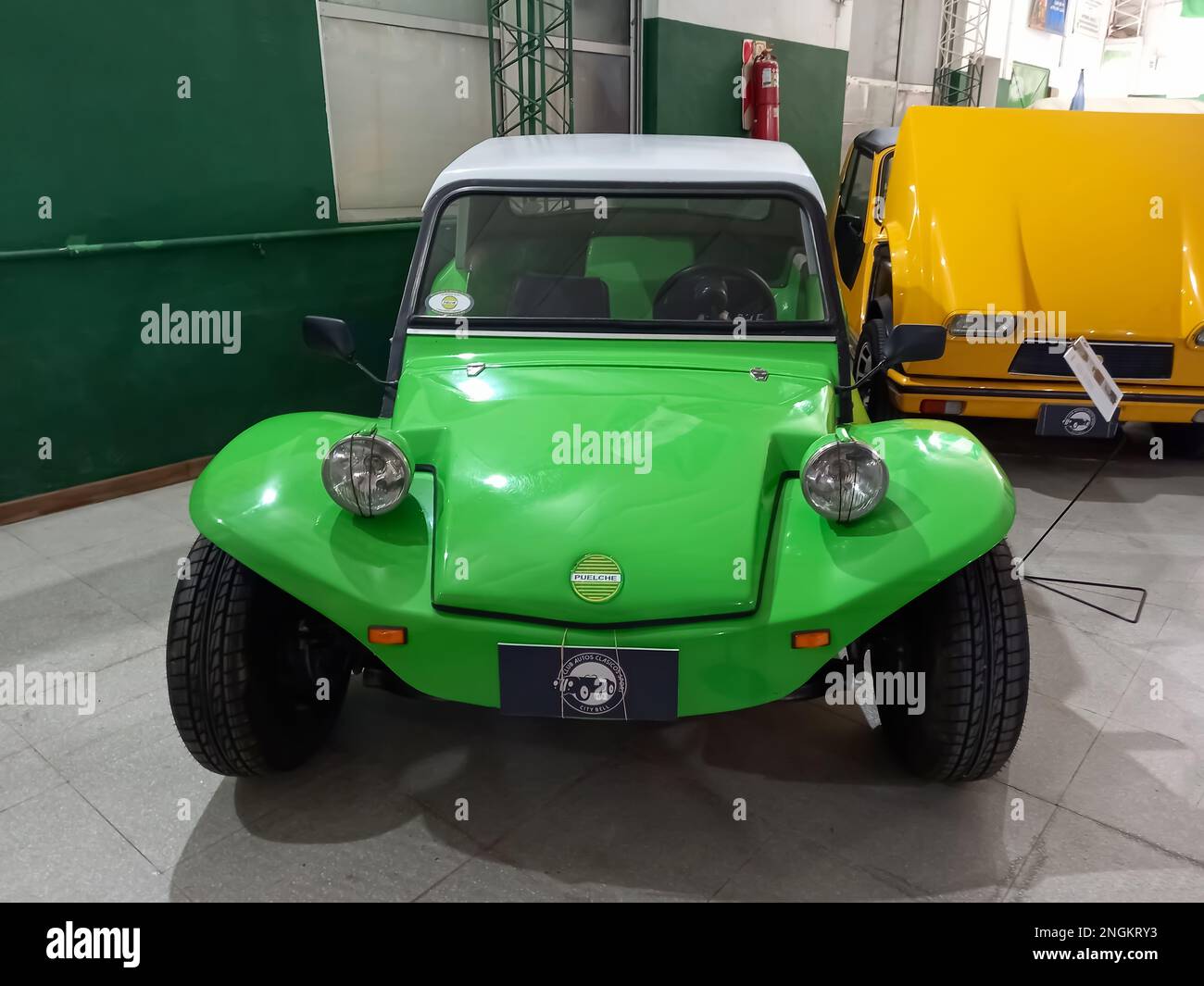 shot of an old green Puelche S2 beach dune Buggy. Classic car show