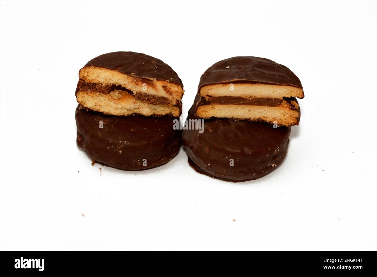 Biscuits filled and coated with natural chocolate, weight gain concept, bakery and pastries