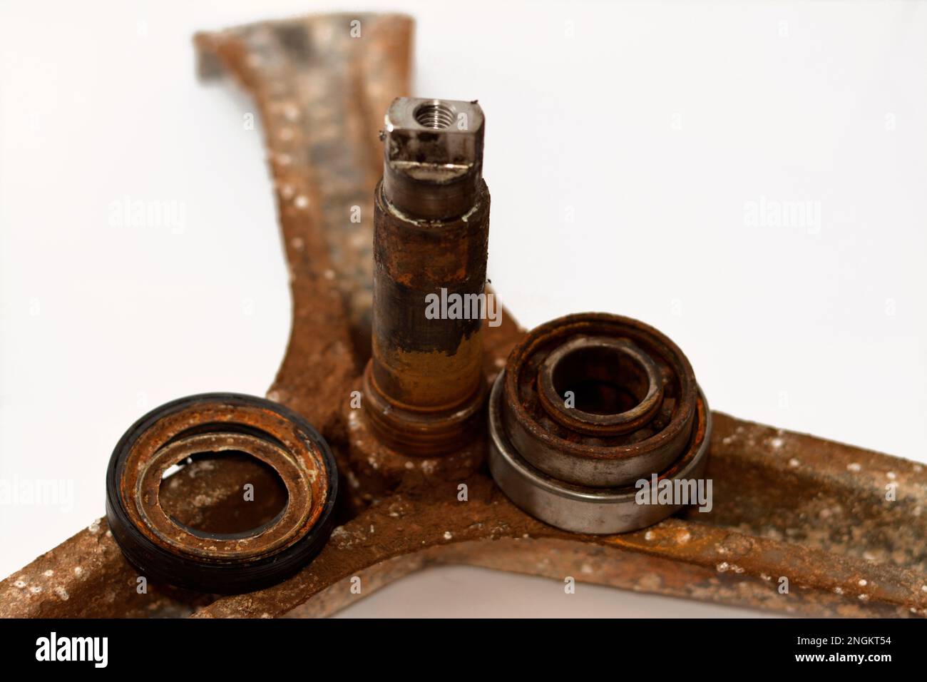 Rusty old dirty automatic electric washing machine drum spider and ball