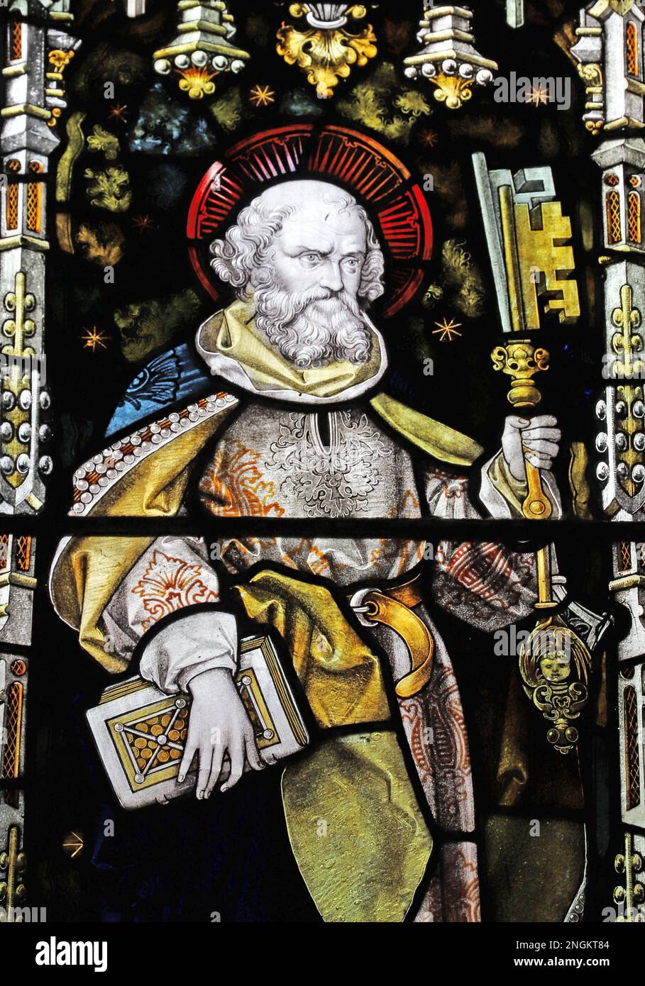 Stained glass window by Percy Bacon & Brothers depicting St Peter, St Mary's & St Bartholomew's Church, Cranborne, Dorset Stock Photo