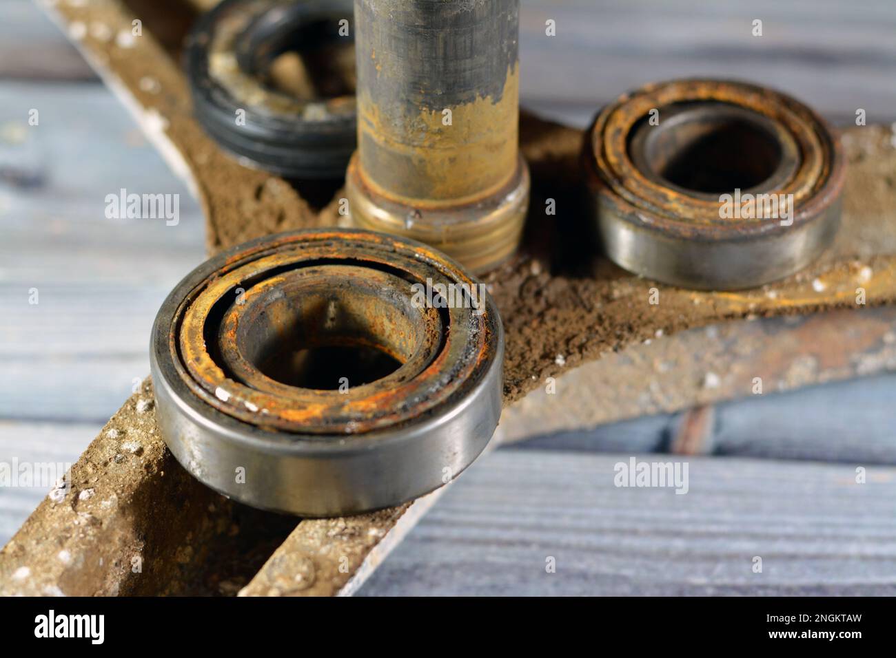 Rusty old dirty automatic electric washing machine drum spider and ball