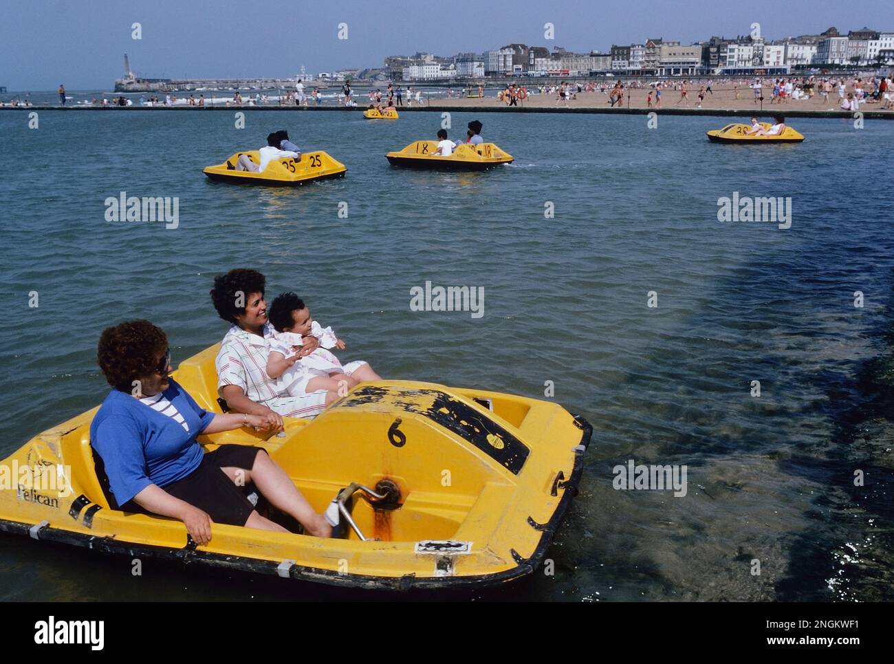 Paddle boating at the Margate tidal pool, Kent, England. July 1987 Stock Photo